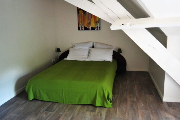 bedroom with double bed gite duras Le Manoir Souillac